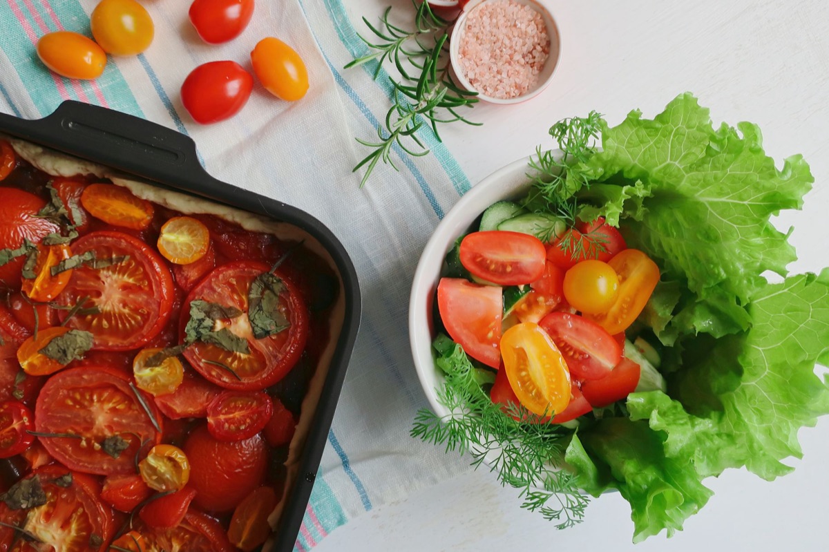 salad bowl with leafy greens and cherry tomatoes